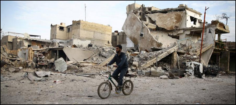 Syria bombs fall district