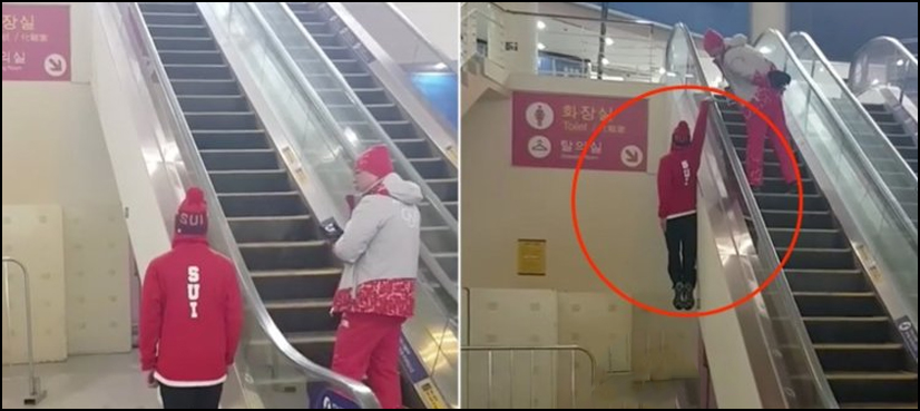 Olympic skier one hand escalator
