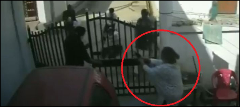 Gun-wielding wife saves husband