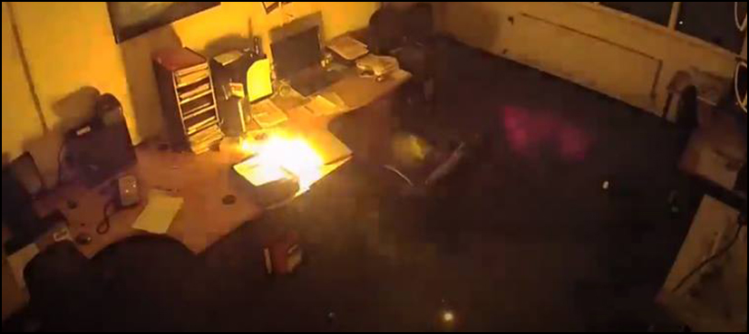 Laptop burst into flames office