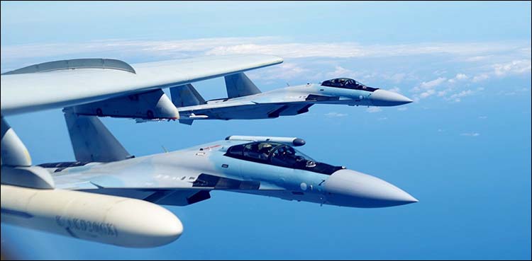 China air force lands bombers on South China Sea island