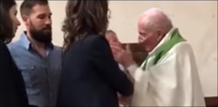 French priest baptism resign