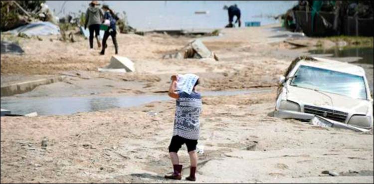 Japan flood toll nears 200,thousands battling thirst