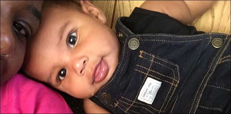 Baby boy dies after he's left for hours in hot car in parking lot