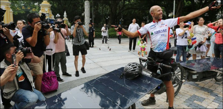 Biker wins first France to China solar bike race