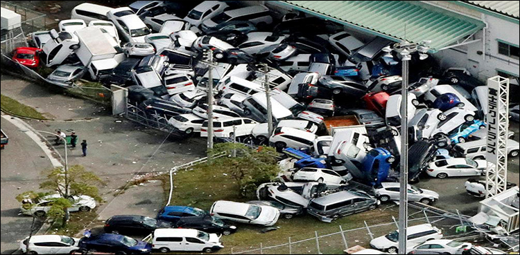 Japan begins clean-up after typhoon kills 11; major airport closed