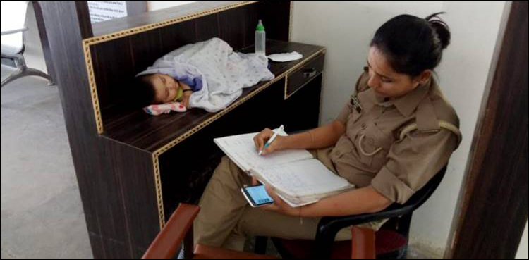 Indian woman constable baby desk