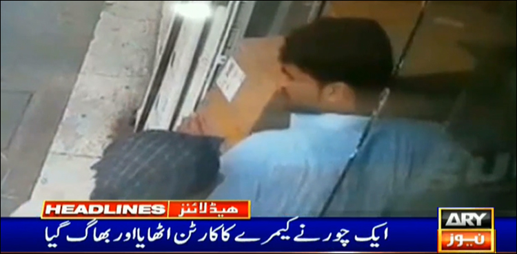 Man, steals, carton of cameras, shopkeeper