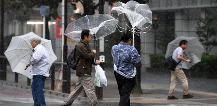 Typhoon Ampil, veers away Japan, transport resume