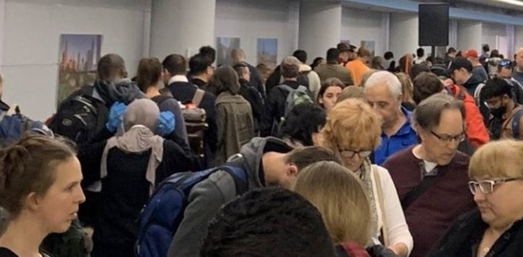 US airports chaos medical screenings Americans