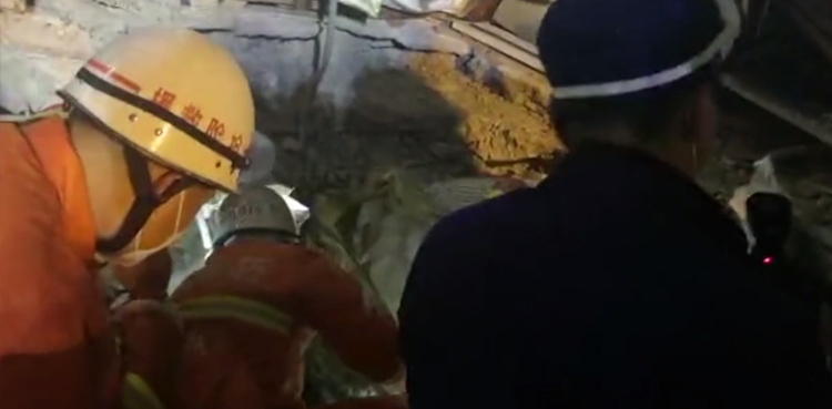 Mother child alive hotel collapse China