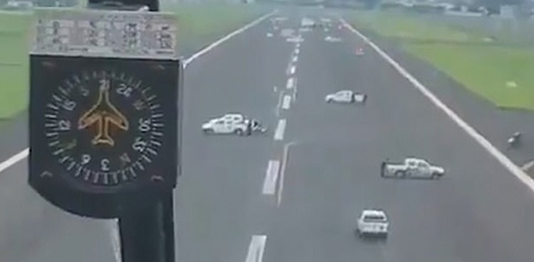 Police park vehicles on runway coronavirus
