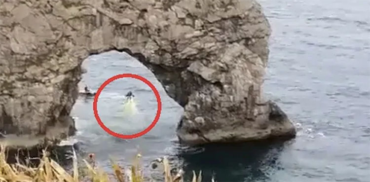 durdle door arch jetpack man