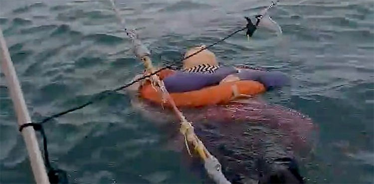floating woman sea colombia