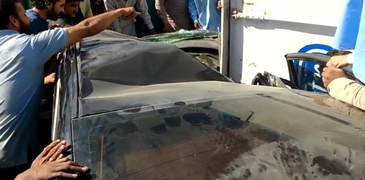 container truck car karachi accident