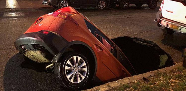 sinkhole, United States, SUV, swallow