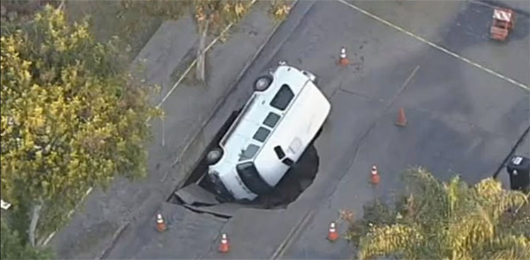 sinkhole, swallows, parked van