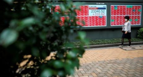 Asian stocks weaken on stimulus worries, dollar holds firm