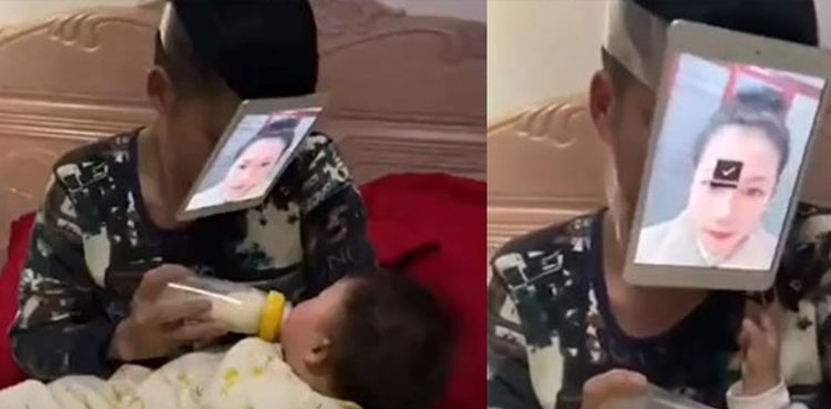 Father feed crying baby