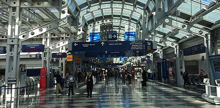 US airport, man inside airport, O’Hare International Airport, COVID-19