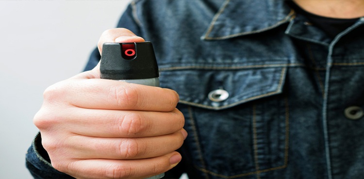 pepper-spray airline airplane boarding