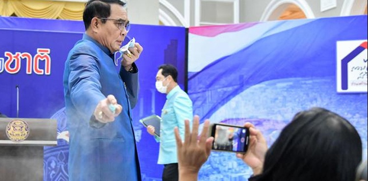 Thai PM Prayuth reporters sanitiser