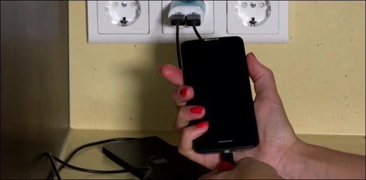 Gujranwala Teenage girl charging mobile phone