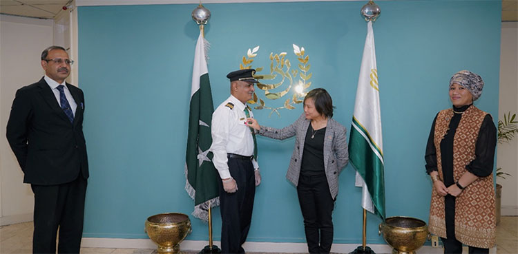 PIA crew, United Nations (UN), soothing baby