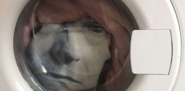 viral photo spotting a face washing machine