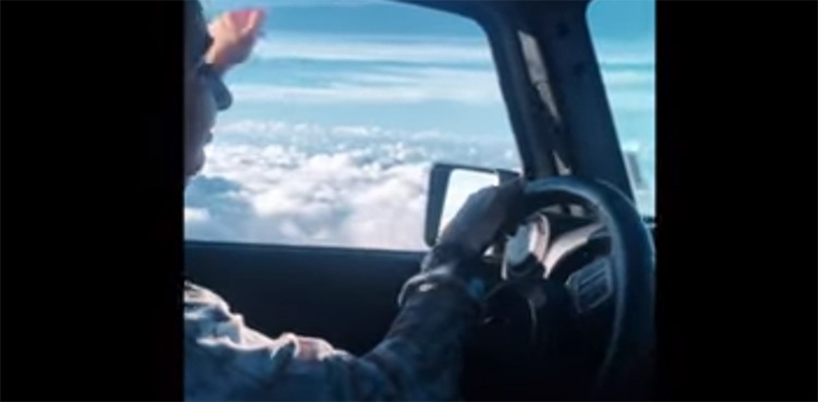 tiktok video, woman, flying jeep through clouds in sky,