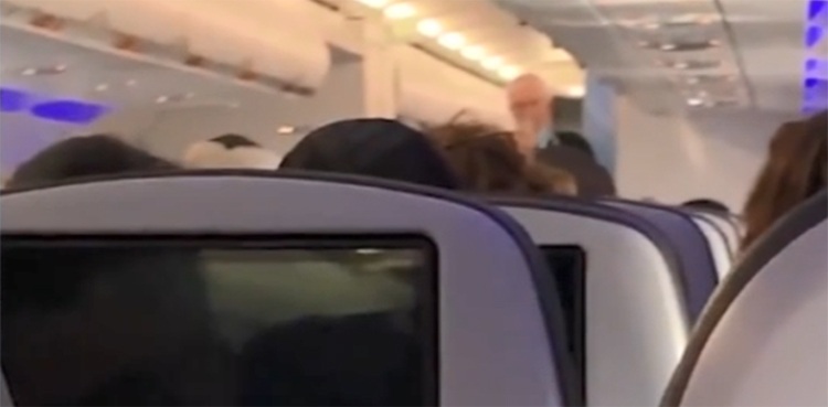 US flight diverted, snorting white substance, harass,