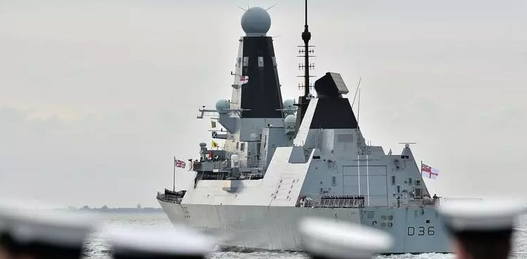 Russia says it fired warning shots at UK ship