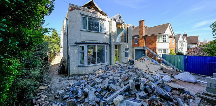 builder demolishes house unpaid bill money dispute