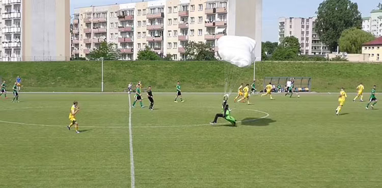 parachutist yellow card soccer match