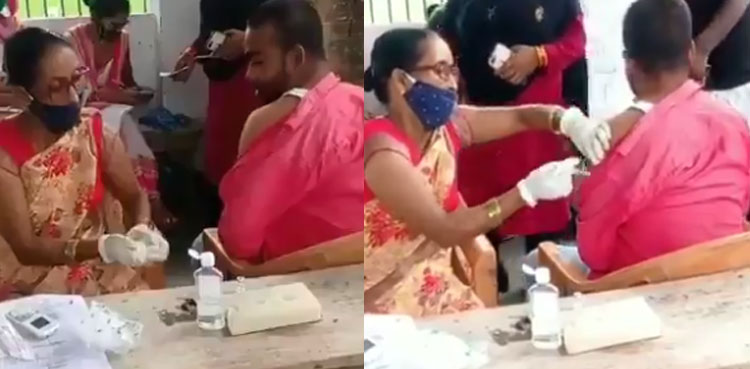 nurse empty syringe covid-19 vaccination india viral video