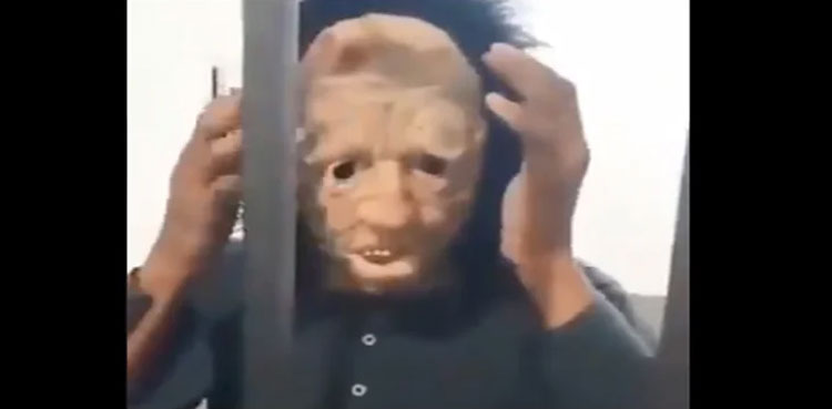 peshawar man scary mask