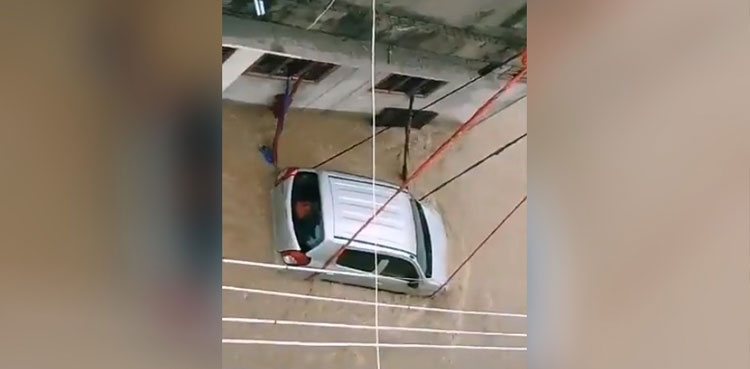 man-ties-car-ropes-flood-hit-telangana-india