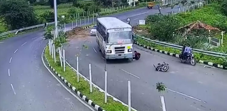 motorcyclist-unhurt-bus