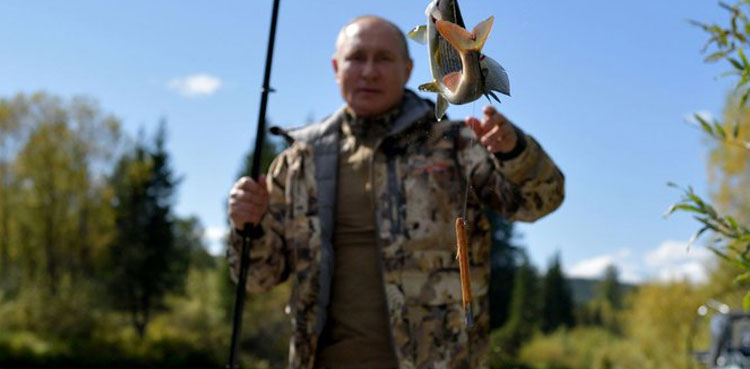Putin ends self-isolation fishing trip