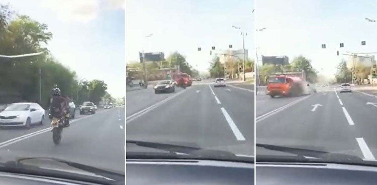 Biker wheelie stunt crash