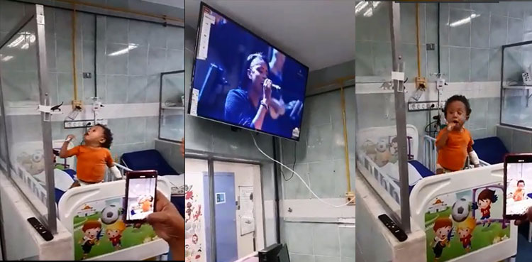 toddler-sings-hospital-bed