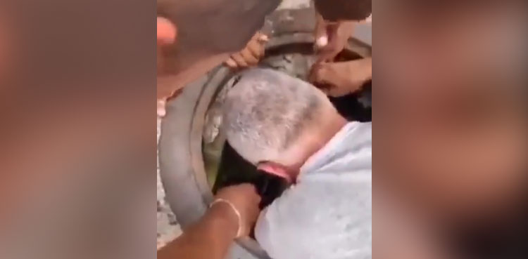 Child manhole rescue Dominican Republic