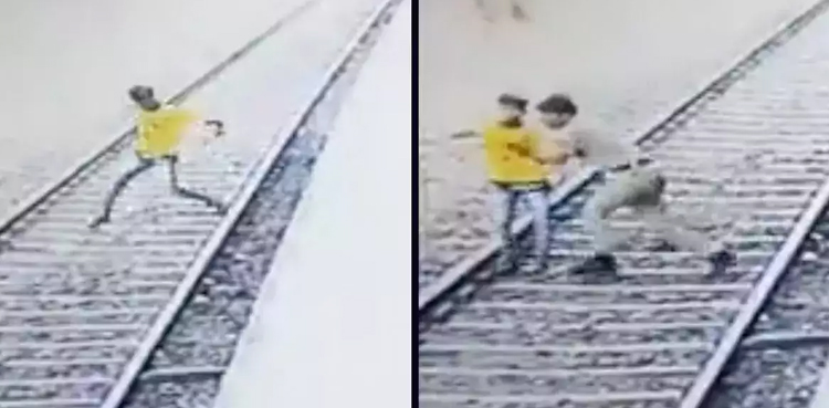 Railway tracks, India, Officer saves boy, boy