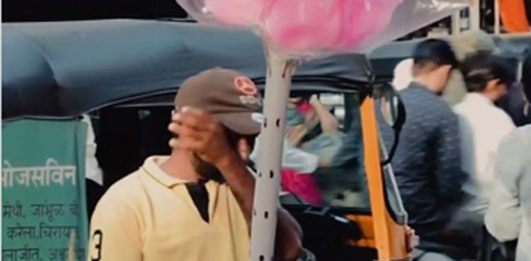 viral video, cotton candy, man breaks down,