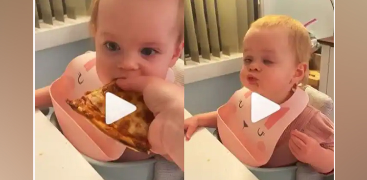 baby, baby girl, pizza, viral video, eating pizza,