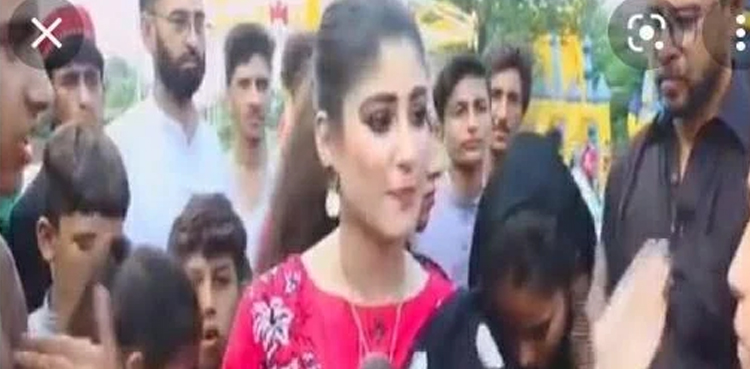 reporter, reporter slaps, pakistan, youth, viral, video