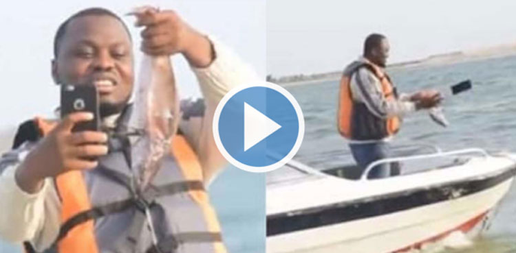 Man takes selfie, fish, Social media, throws phone