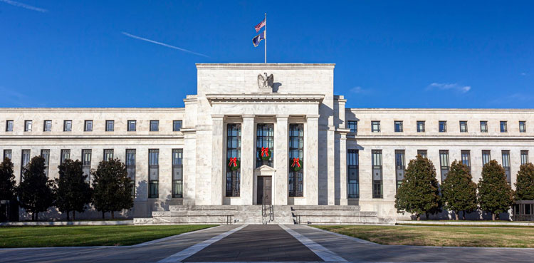Asian markets sink, hawkish Fed outlook
