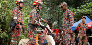 Four dead eight missing, China landslide, heavy rain