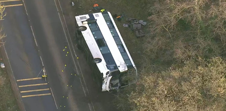 Bus overturns, double-decker bus, motorcyclist, England